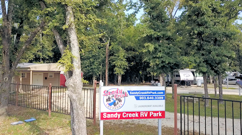The entrance sign and office.